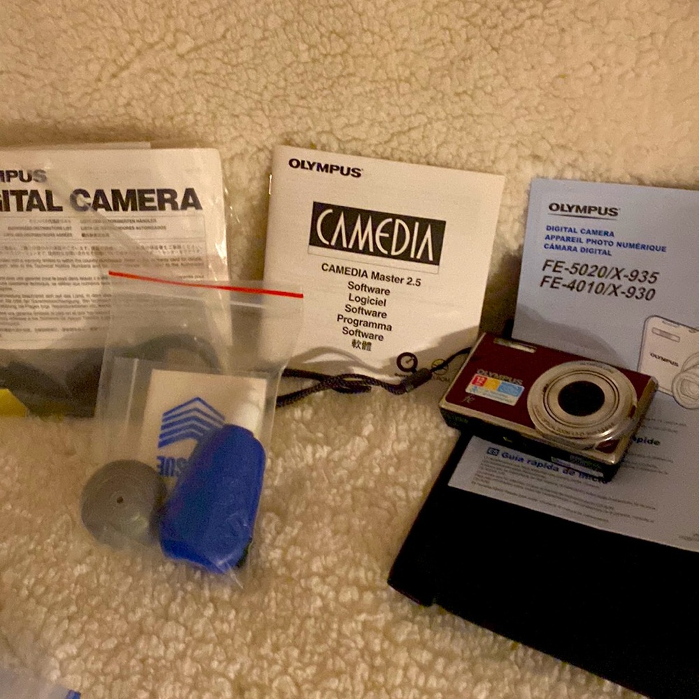 Gifted.  Olympus Digital Camera with all that came with it. Original cost $150. - Picture 2 of 9
